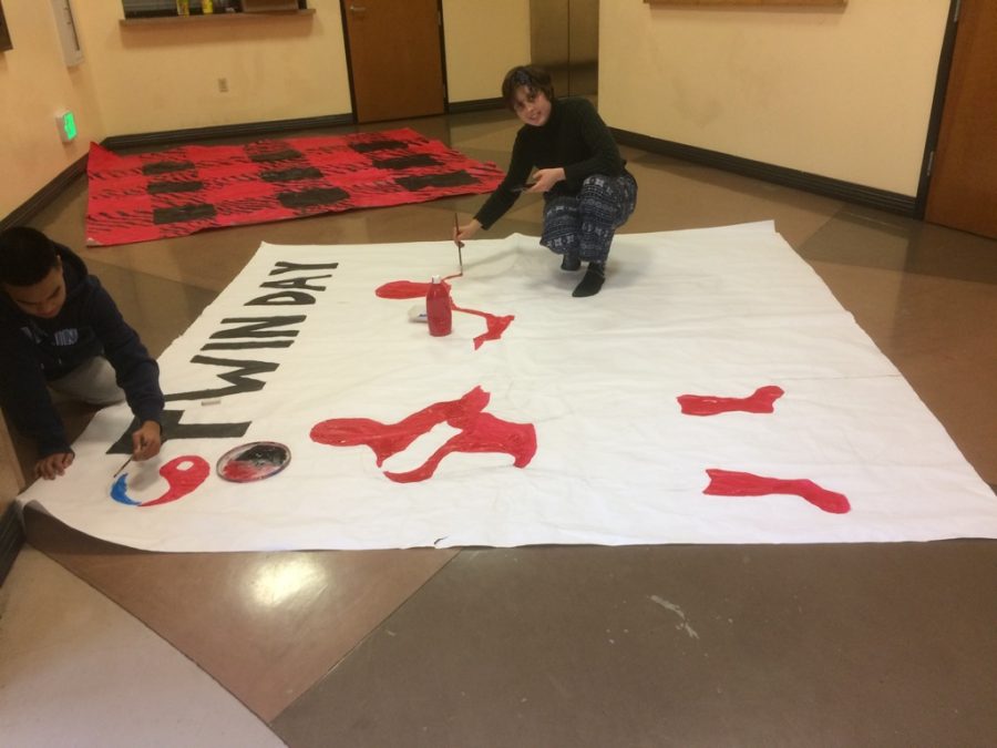 Kyle+Lopez+%2812%29+and+Adam+Lawson+%2810%29+create+the+spirit+day+poster+for+Twin+Day+on+Jan.+20.+ASB+members+spend+time+painting+the+backdrop+for+each+spirit+day+for+students+to+use+when+taking+photos.