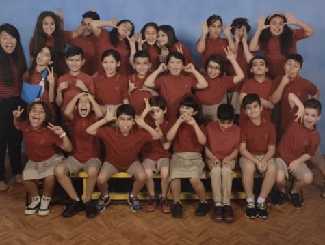 Siu takes a silly classroom picture with her fourth grade students in 2018 at Kuwait American School.